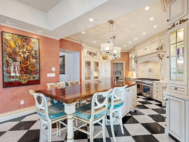 a view of a spacious bedroom with a window