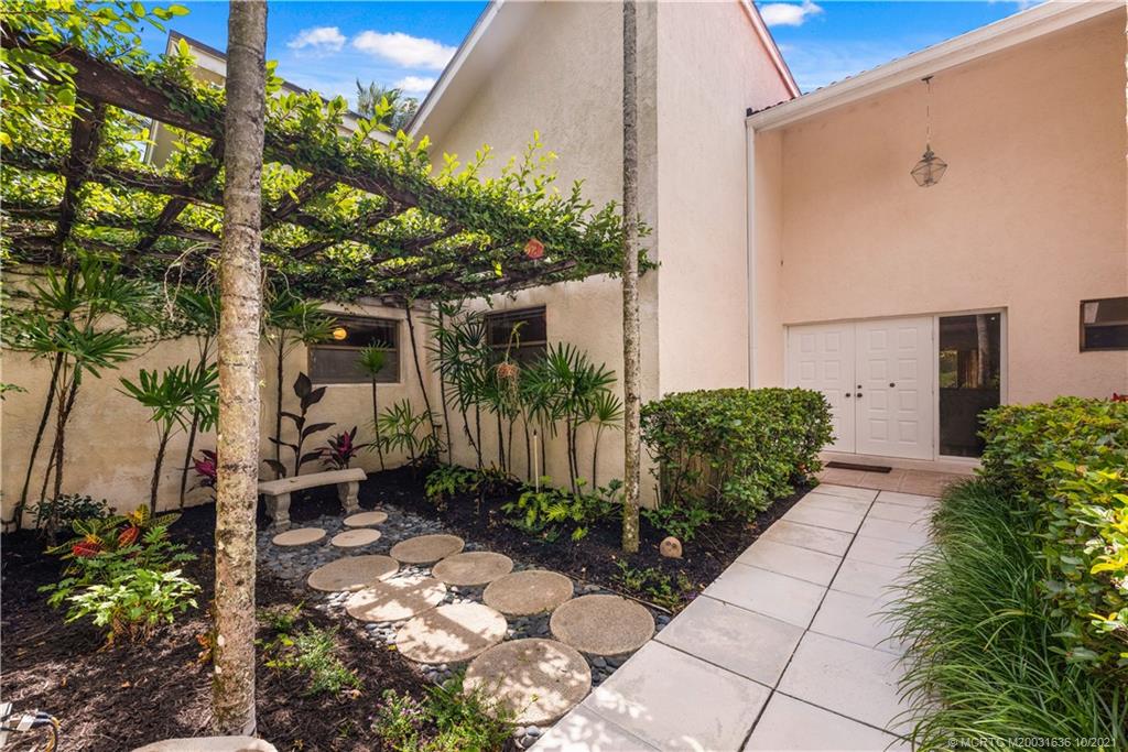 114 North Beach Road Hobe Sound, FL 33455 - Photo 14 of 37 a view of yard with patio