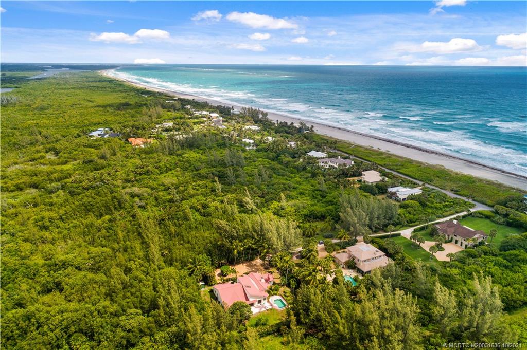 114 North Beach Road Hobe Sound, FL 33455 - Photo 4 of 37 a view of an ocean from a balcony