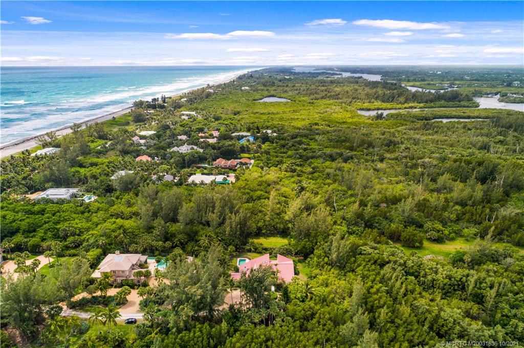 114 North Beach Road Hobe Sound, FL 33455 - Photo 5 of 37 a view of a city with an ocean