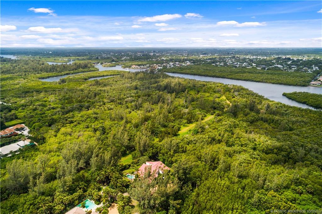 114 North Beach Road Hobe Sound, FL 33455 - Photo 6 of 37 a view of a city with an ocean