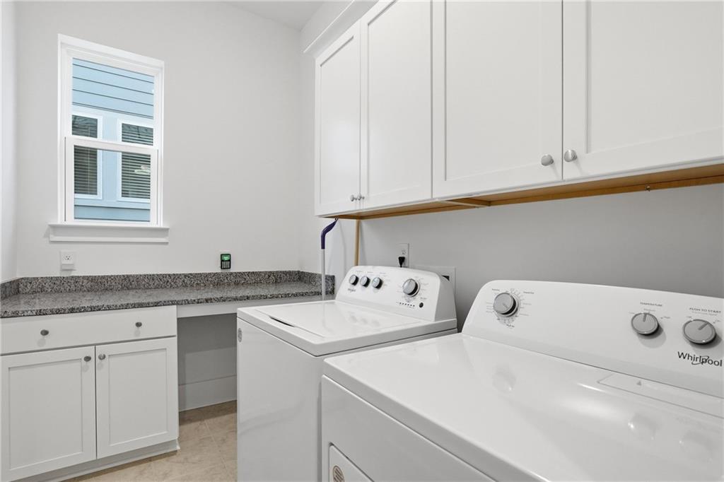 6742 Welcome Road Flowery Branch, GA 30542 - Photo 28 of 48 a utility room with dryer and washer