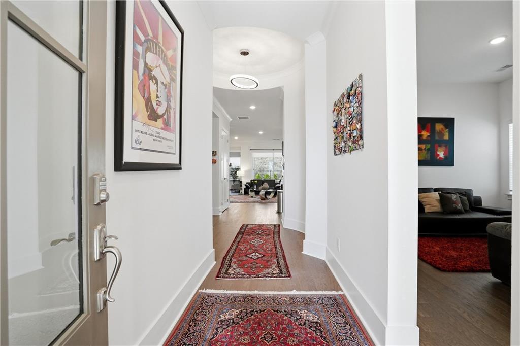 6742 Welcome Road Flowery Branch, GA 30542 - Photo 4 of 48 a view of hallway with furniture and rug