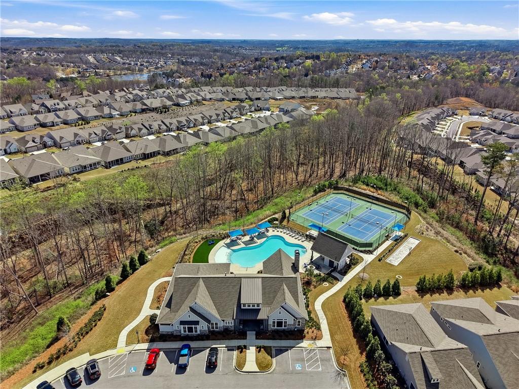 6742 Welcome Road Flowery Branch, GA 30542 - Photo 41 of 48 an aerial view of residential houses with outdoor space