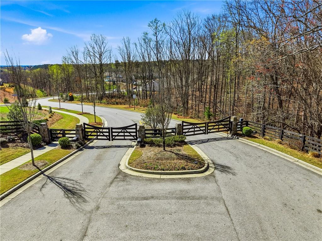 6742 Welcome Road Flowery Branch, GA 30542 - Photo 48 of 48 a view of swimming pool with chairs
