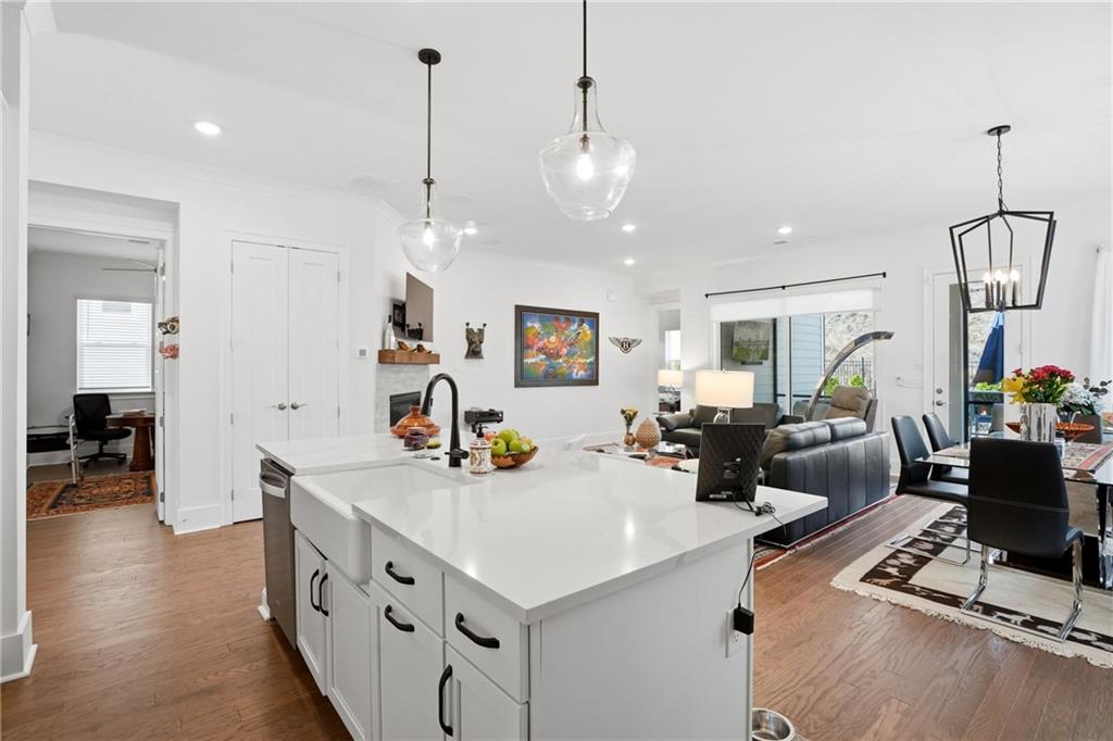 6742 Welcome Road Flowery Branch, GA 30542 - Photo 9 of 48 a view of a living room and kitchen