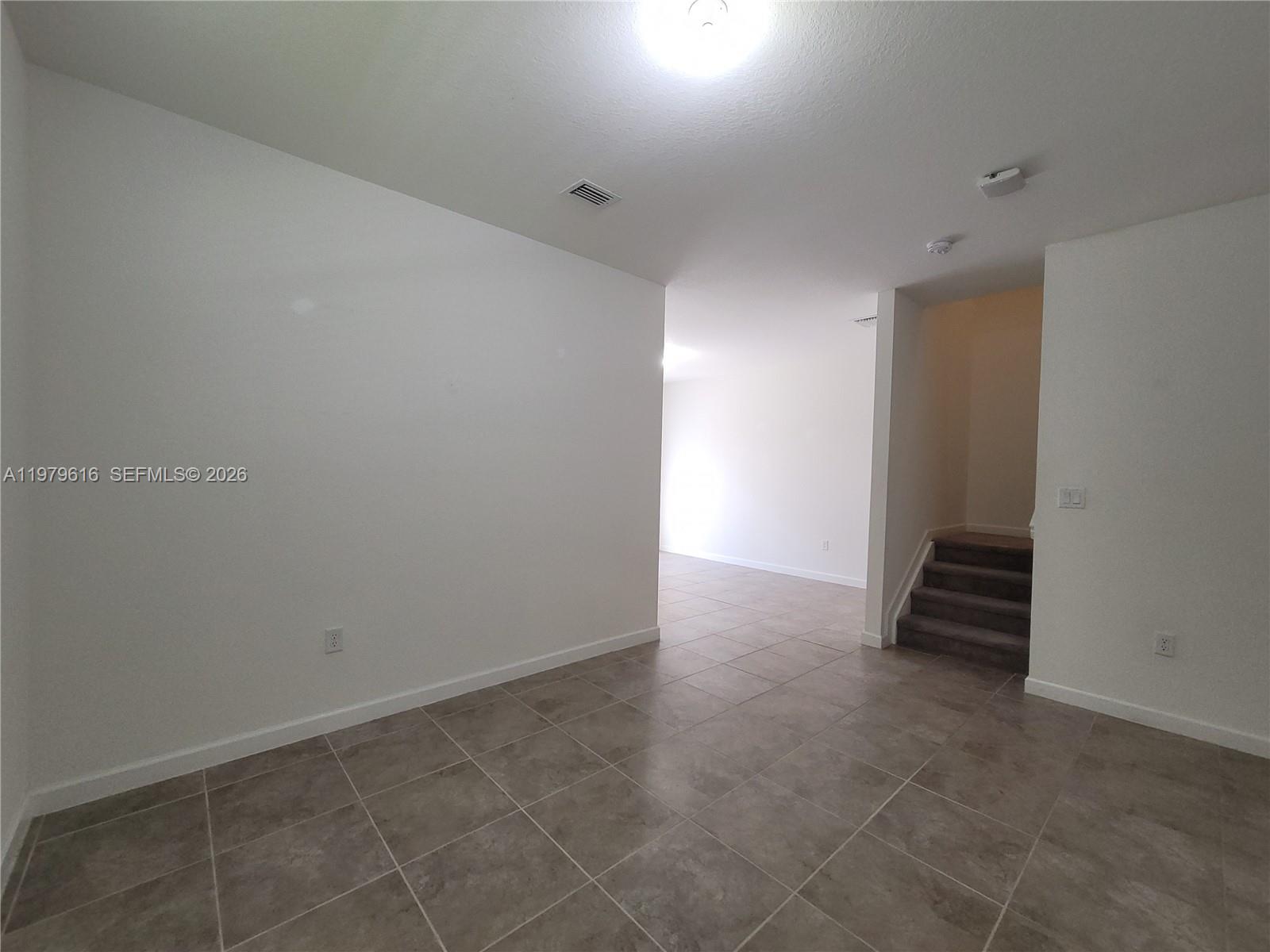 25039 Southwest 114th Avenue Homestead, FL 33032 - Photo 12 of 45 a view of an empty room
