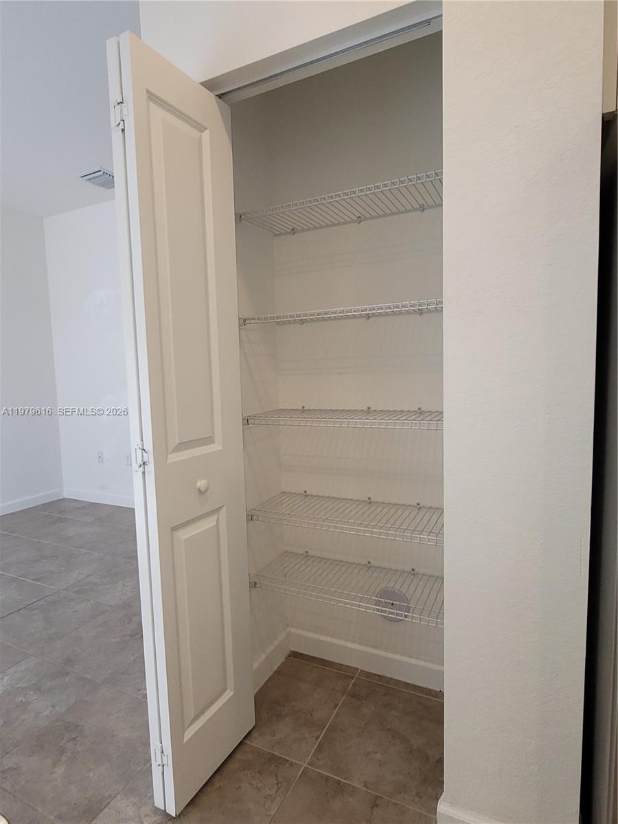 25039 Southwest 114th Avenue Homestead, FL 33032 - Photo 16 of 45 a view of a room