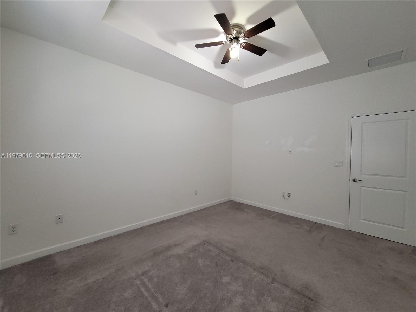 25039 Southwest 114th Avenue Homestead, FL 33032 - Photo 26 of 45 an empty room with a empty space and a ceiling fan