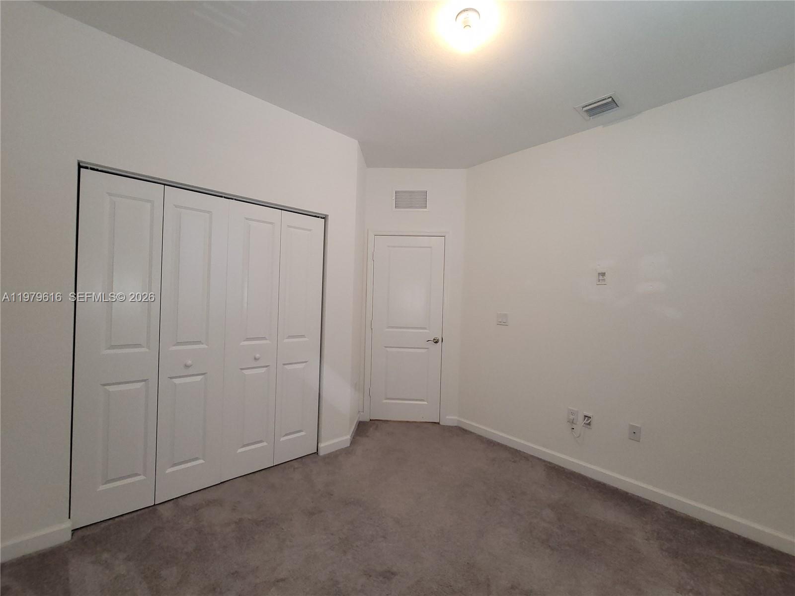 25039 Southwest 114th Avenue Homestead, FL 33032 - Photo 38 of 45 a view of an empty room