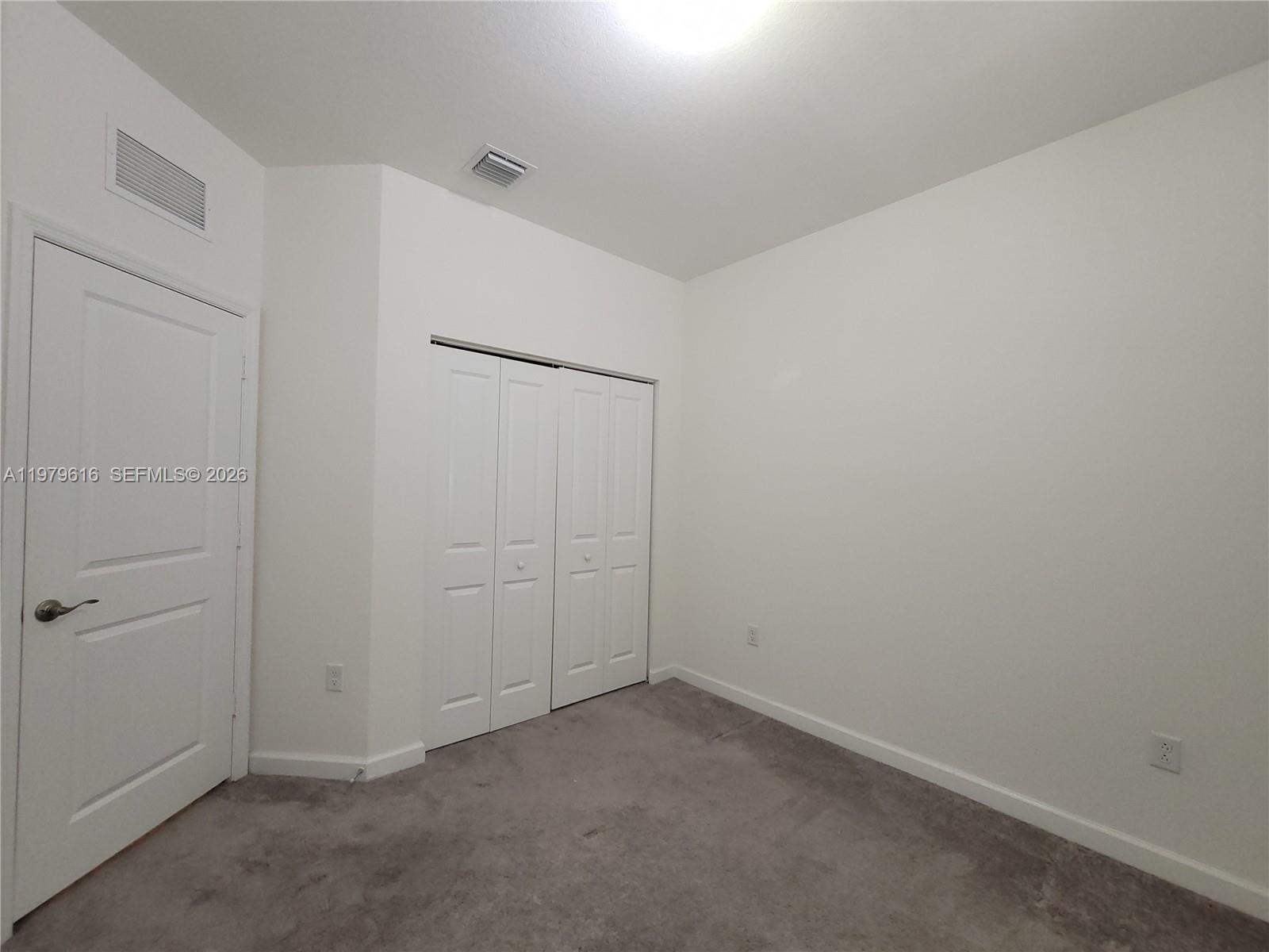 25039 Southwest 114th Avenue Homestead, FL 33032 - Photo 44 of 45 a view of an empty room