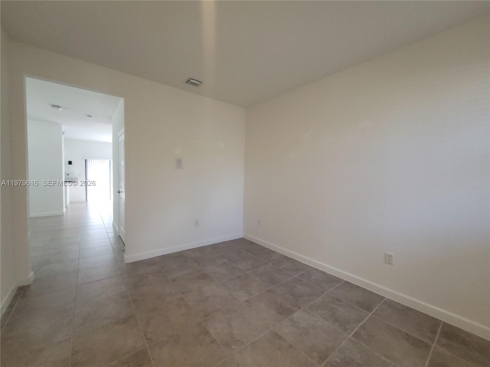 25039 Southwest 114th Avenue Homestead, FL 33032 - Photo 7 of 45 a view of empty room