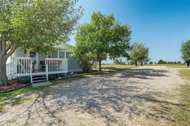 5845 Peerless Farms Road Peyton, CO 80831 - Photo 23 of 50 View of yard