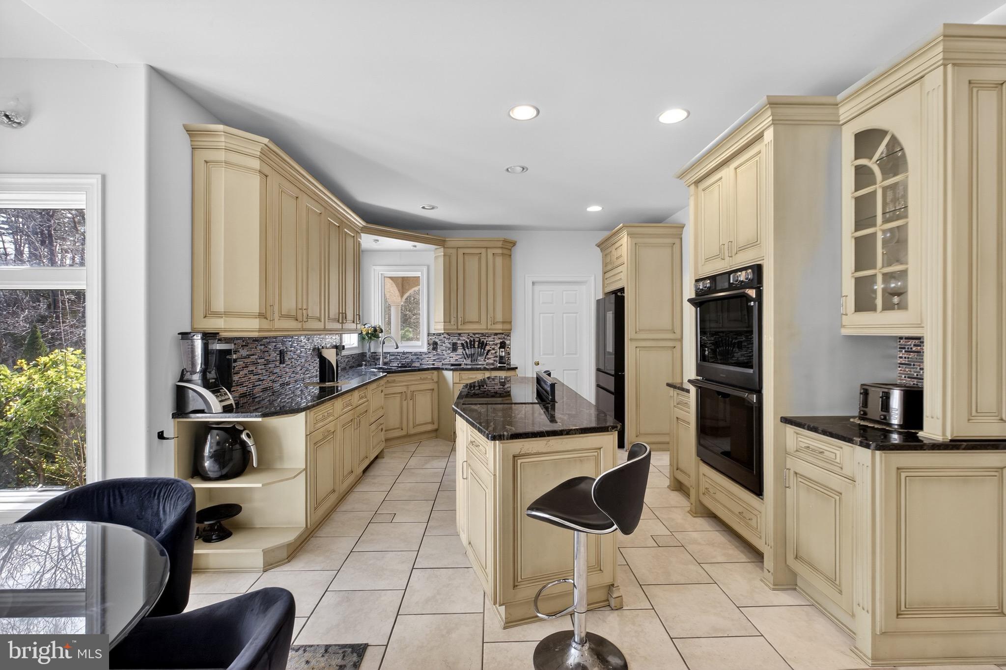 164 Old New York Road Absecon, NJ 08205 - Photo 11 of 81 a kitchen with stainless steel appliances granite countertop a stove and a refrigerator