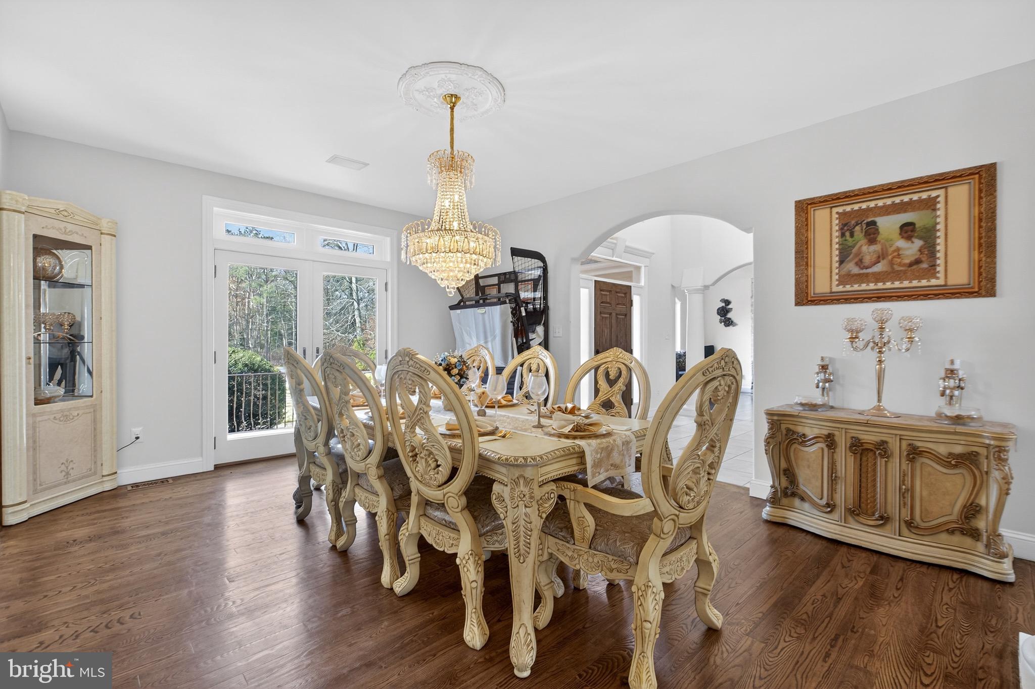 164 Old New York Road Absecon, NJ 08205 - Photo 20 of 81 a view of a dining room with furniture wooden floor and chandelier