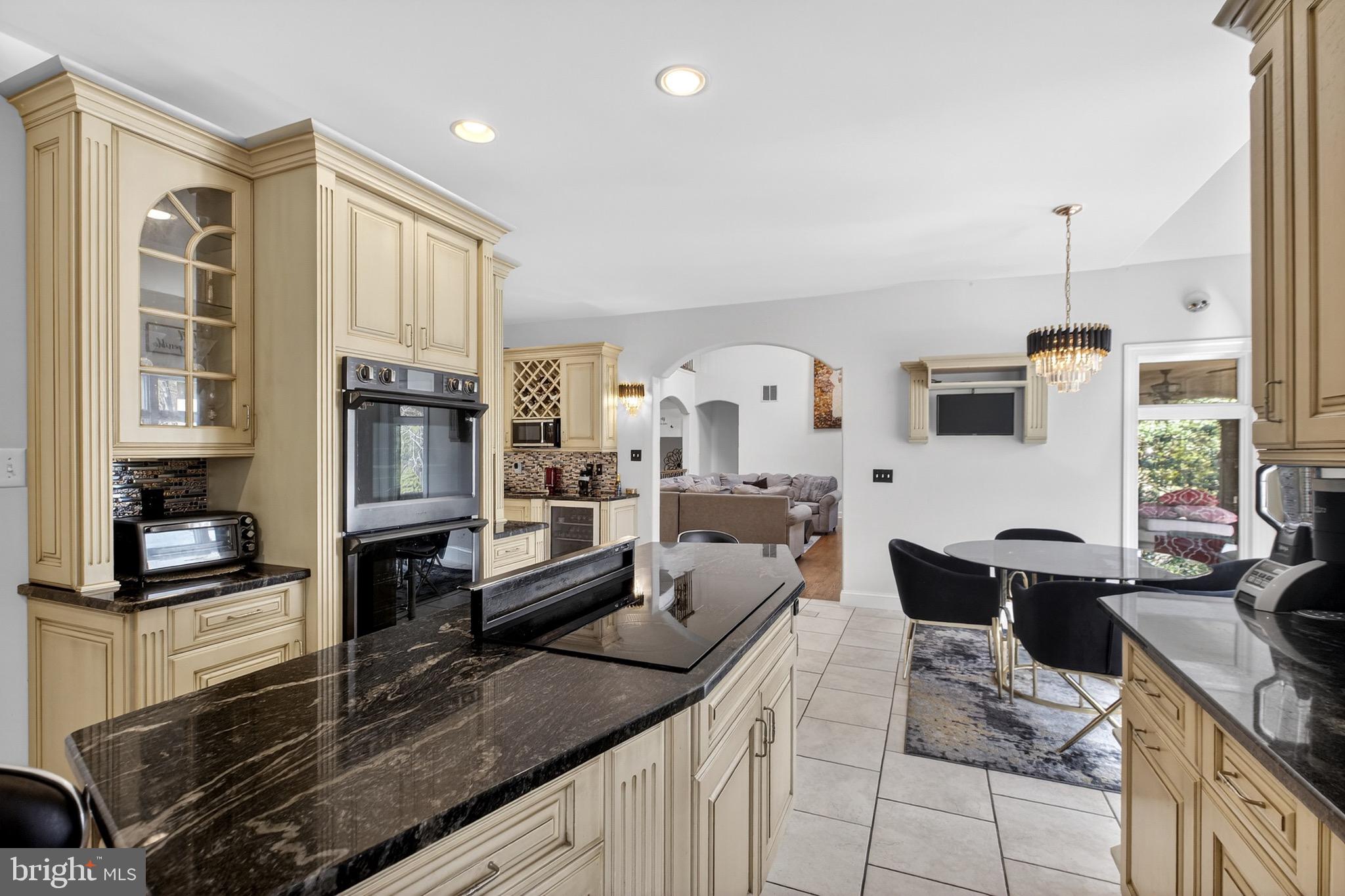 164 Old New York Road Absecon, NJ 08205 - Photo 23 of 81 a large kitchen with lots of counter space and windows