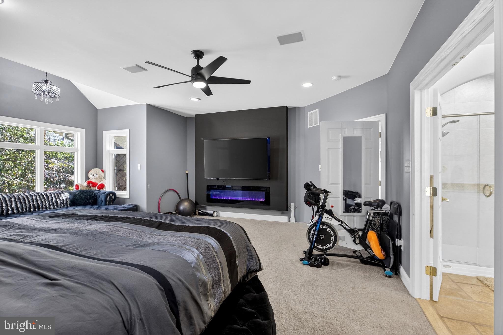 164 Old New York Road Absecon, NJ 08205 - Photo 34 of 81 a bedroom with bed a ceiling fan and a large window