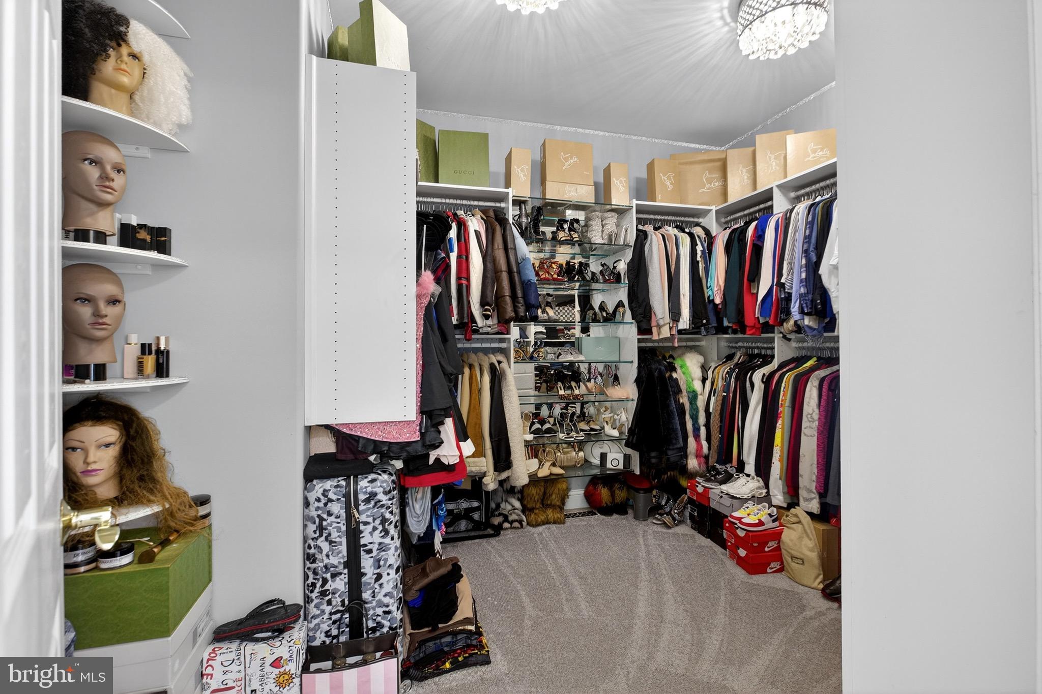 164 Old New York Road Absecon, NJ 08205 - Photo 35 of 81 a view of walk in closet with clothes