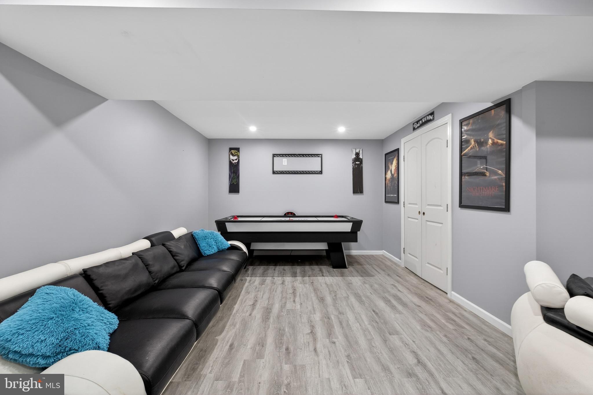 164 Old New York Road Absecon, NJ 08205 - Photo 39 of 81 a living room with furniture and a wooden floor