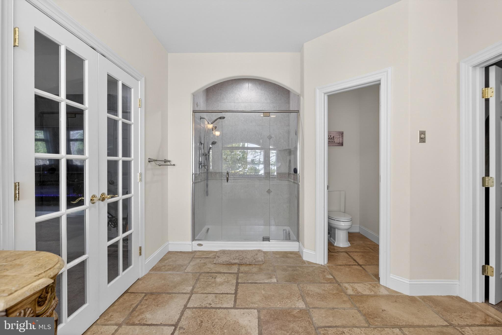 164 Old New York Road Absecon, NJ 08205 - Photo 40 of 81 a view of a bathroom with a glass door shower