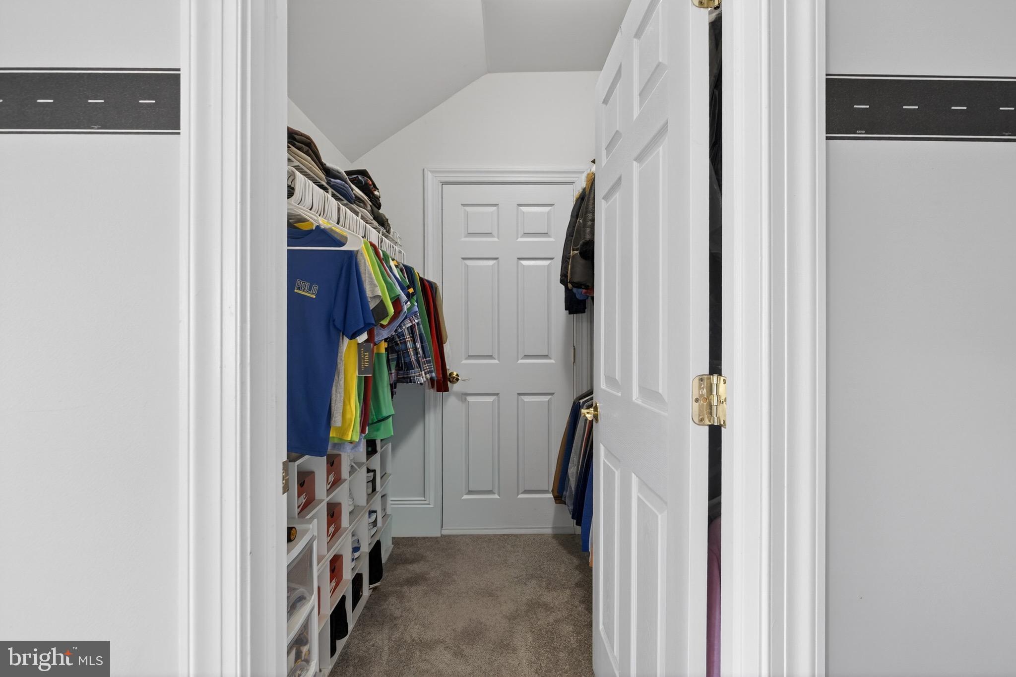 164 Old New York Road Absecon, NJ 08205 - Photo 52 of 81 a view of walk in closet with clothes