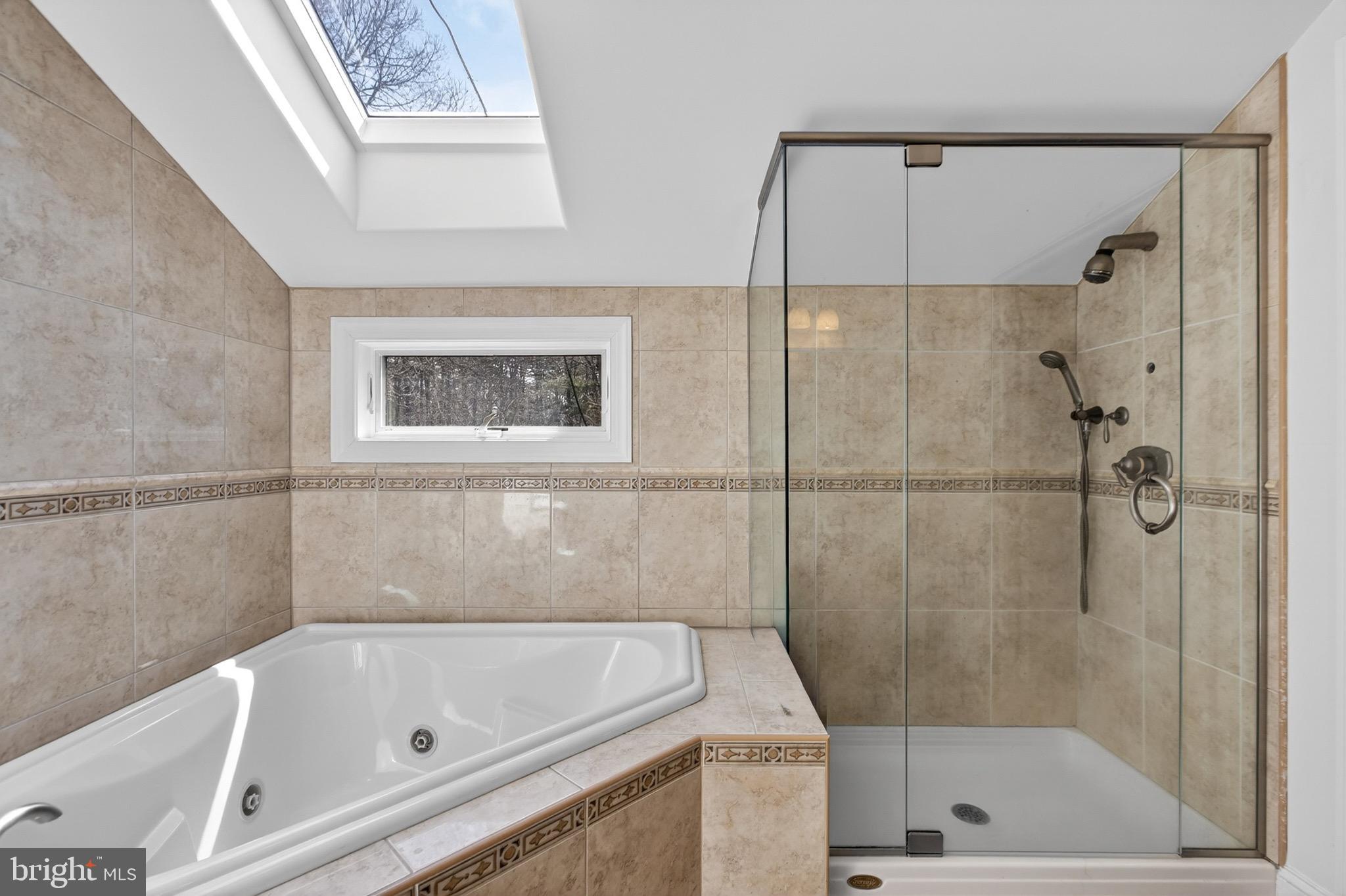 164 Old New York Road Absecon, NJ 08205 - Photo 60 of 81 a bathroom with a tub and a shower