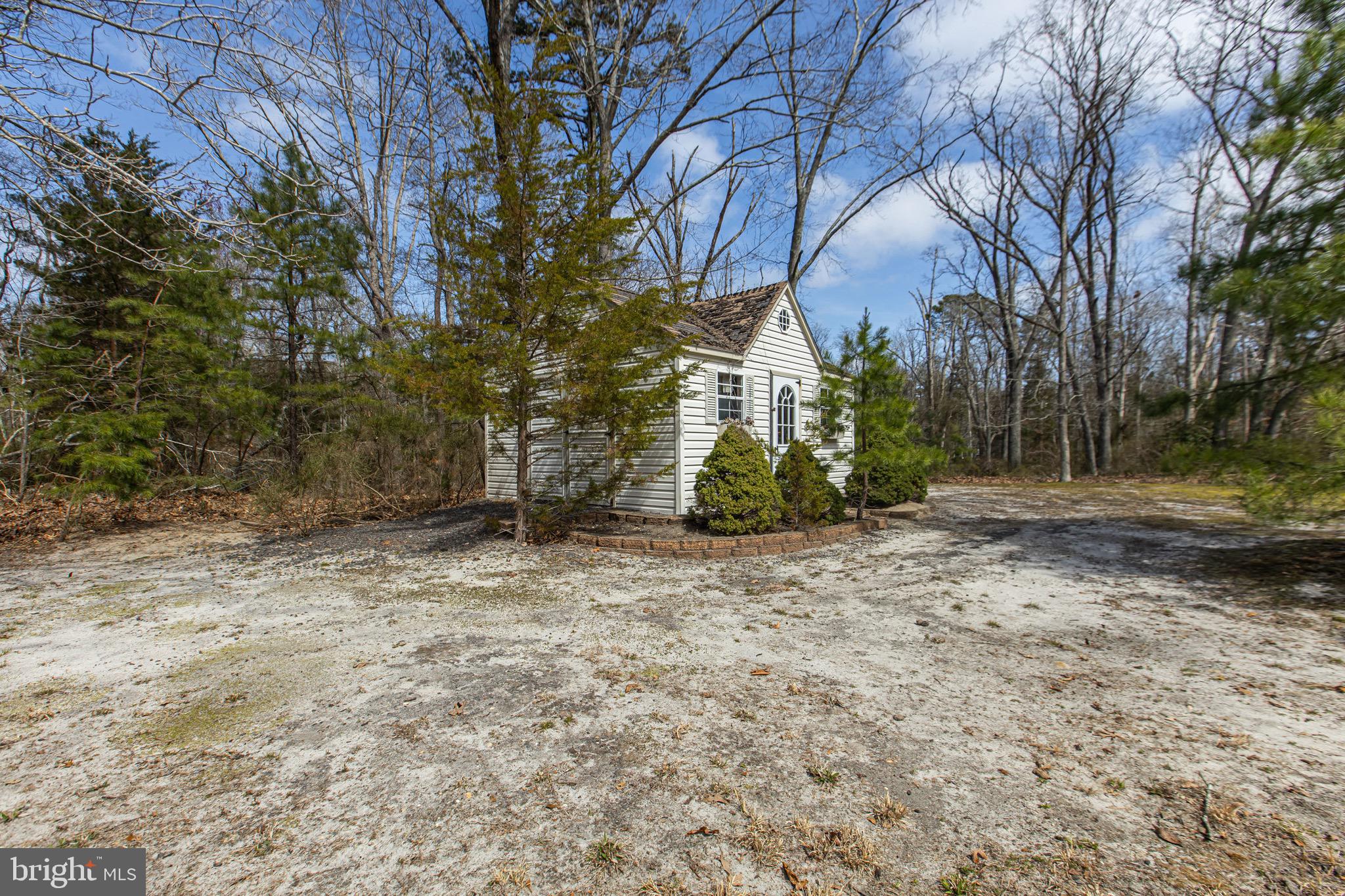 164 Old New York Road Absecon, NJ 08205 - Photo 65 of 81 a view of a yard with plants and trees
