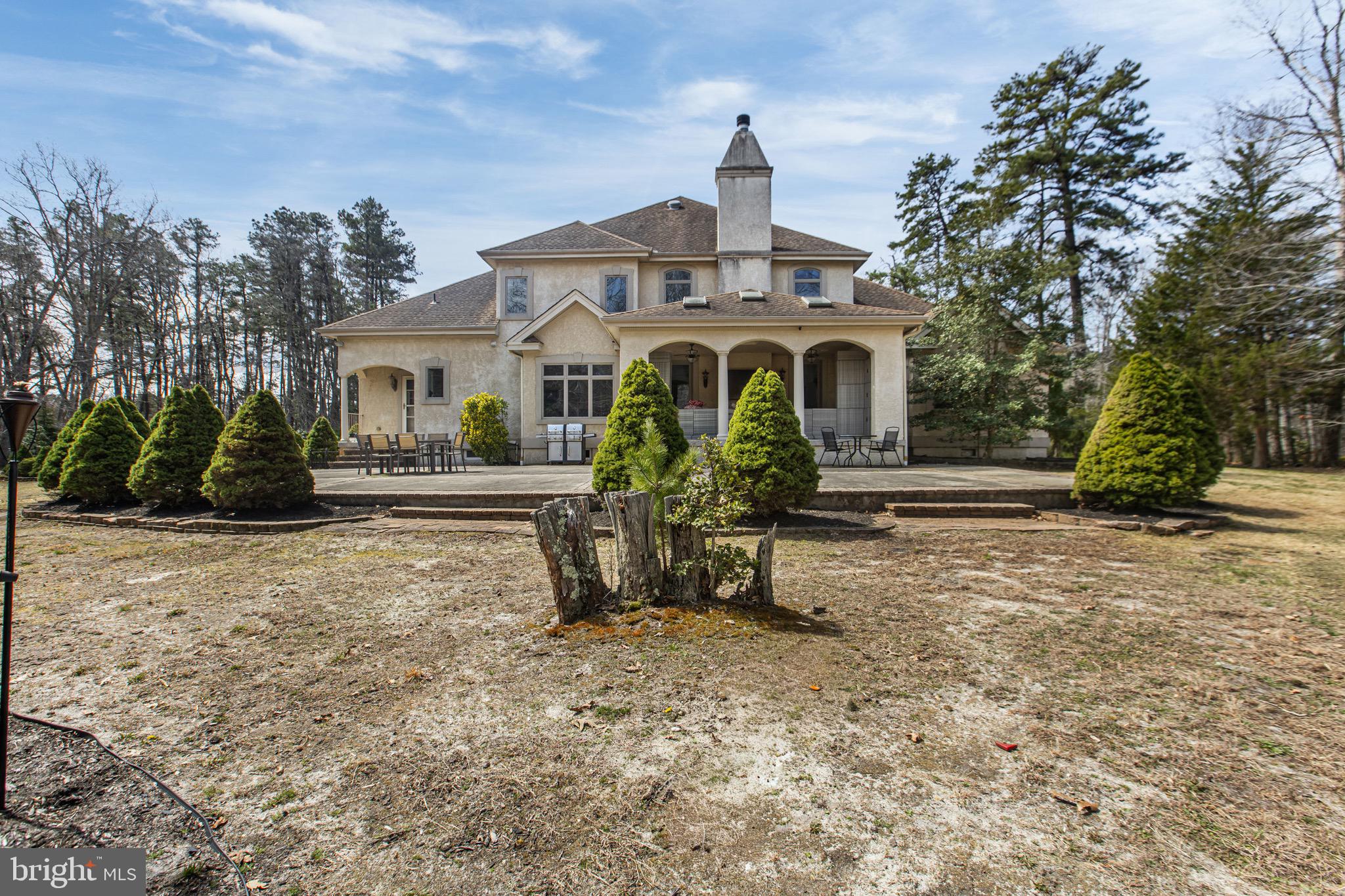 164 Old New York Road Absecon, NJ 08205 - Photo 69 of 81 a front view of a house with garden