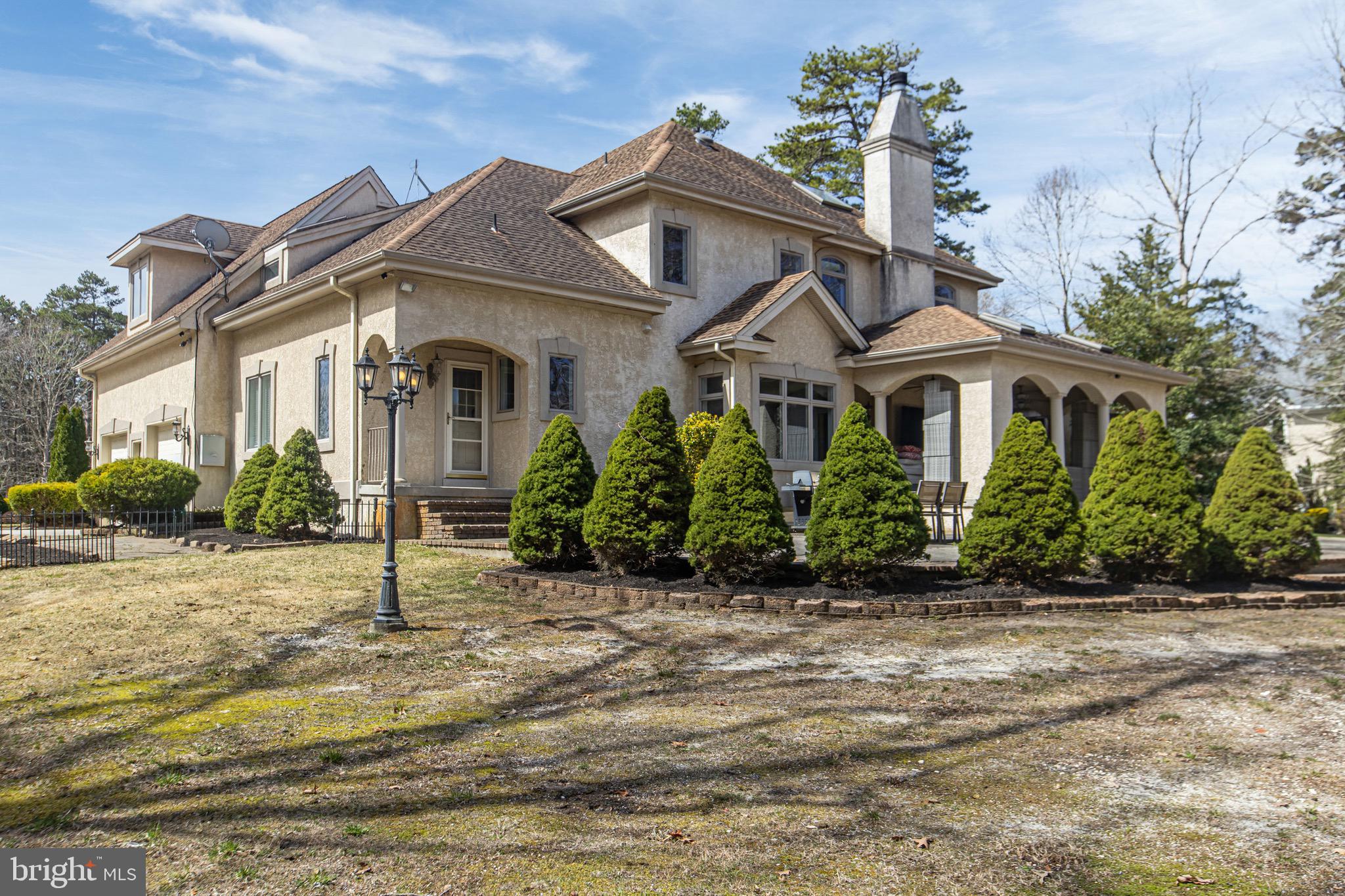 164 Old New York Road Absecon, NJ 08205 - Photo 71 of 81 a front view of a house with a yard