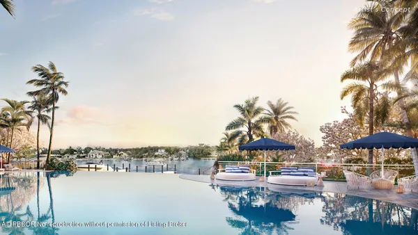 a black and white photo of a book and a white wall