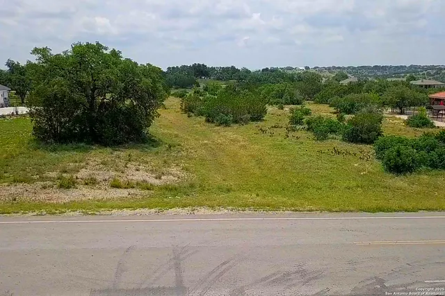 a view of a yard with an outdoor space