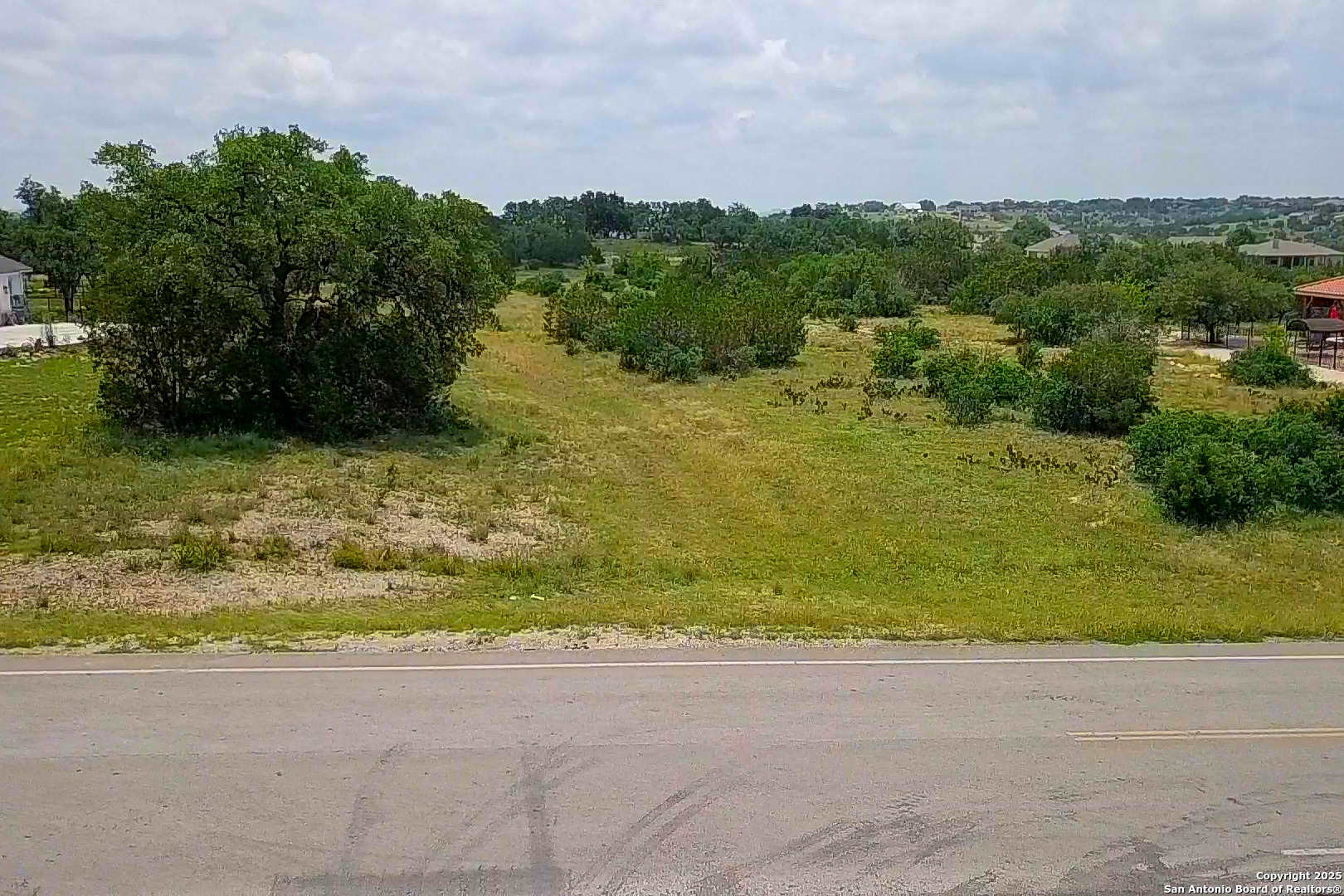 473 Mystic Parkway Spring Branch, TX 78070 - Photo 3 of 23 a view of a yard with an outdoor space