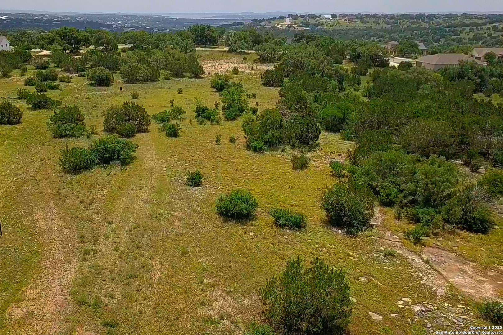 473 Mystic Parkway Spring Branch, TX 78070 - Photo 5 of 23 a view of a lake with houses