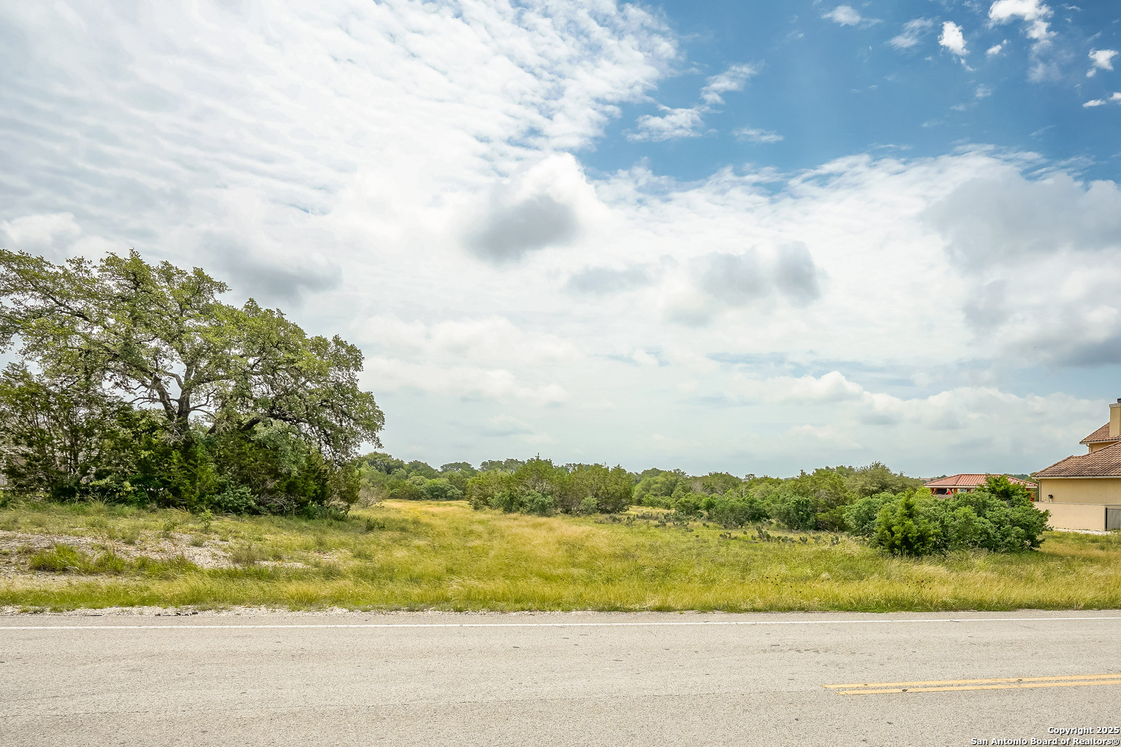 473 Mystic Parkway Spring Branch, TX 78070 - Photo 10 of 23 a view of a yard with an ocean beach