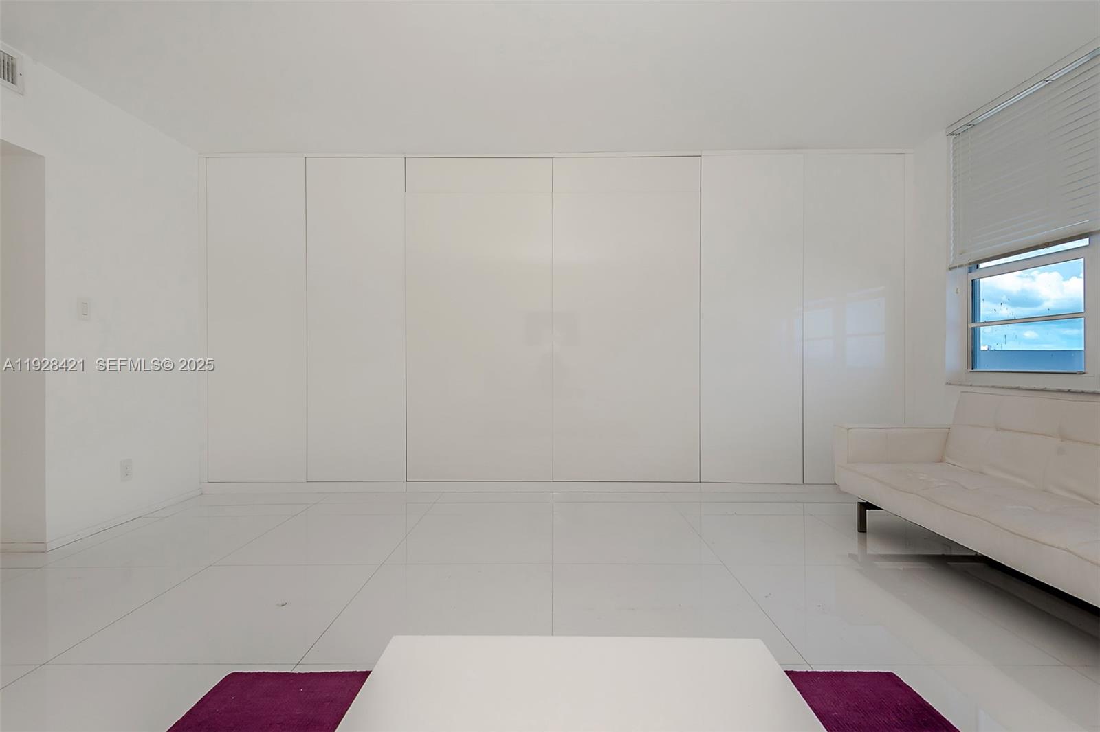 100 Lincoln Road, Unit 839 Miami Beach, FL 33139 - Photo 22 of 26 a bathroom with a bathtub