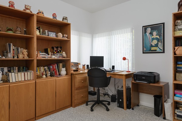 50 Holly Hill Road Barnstable, MA 02632 - Photo 13 of 14 a view of a workspace with bookshelf