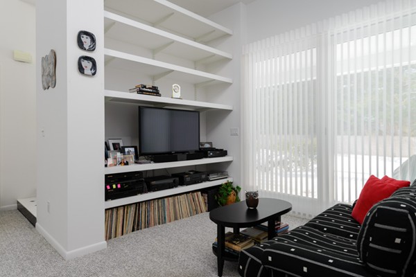 50 Holly Hill Road Barnstable, MA 02632 - Photo 3 of 14 a room with furniture and a flat screen tv