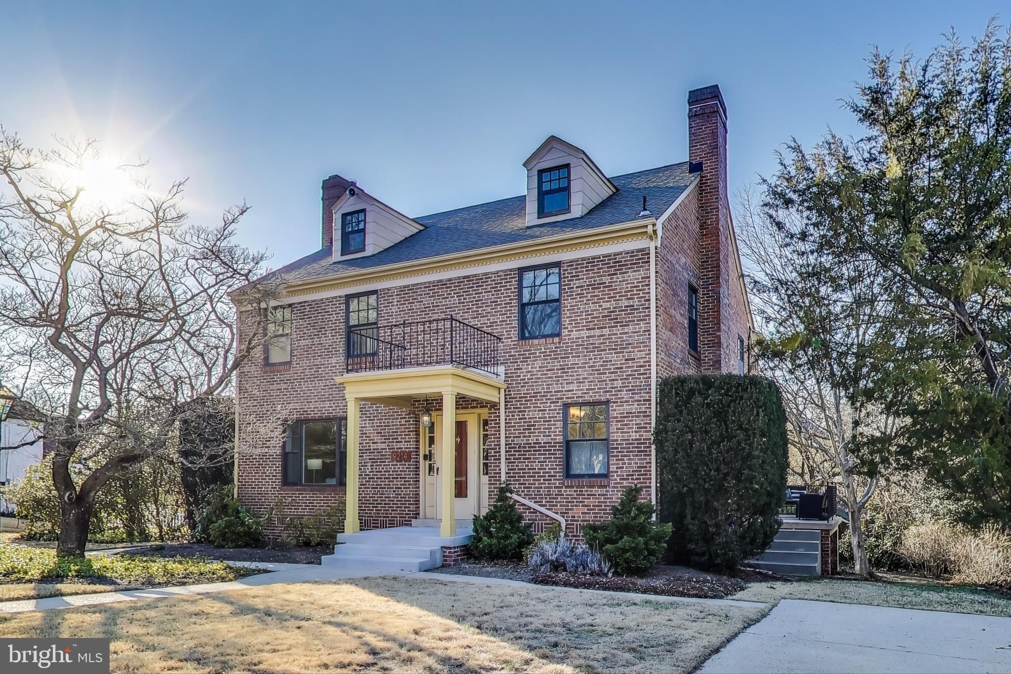 9214 Kingsbury Drive Silver Spring, MD 20910 - Photo 2 of 67 a front view of a house with a yard