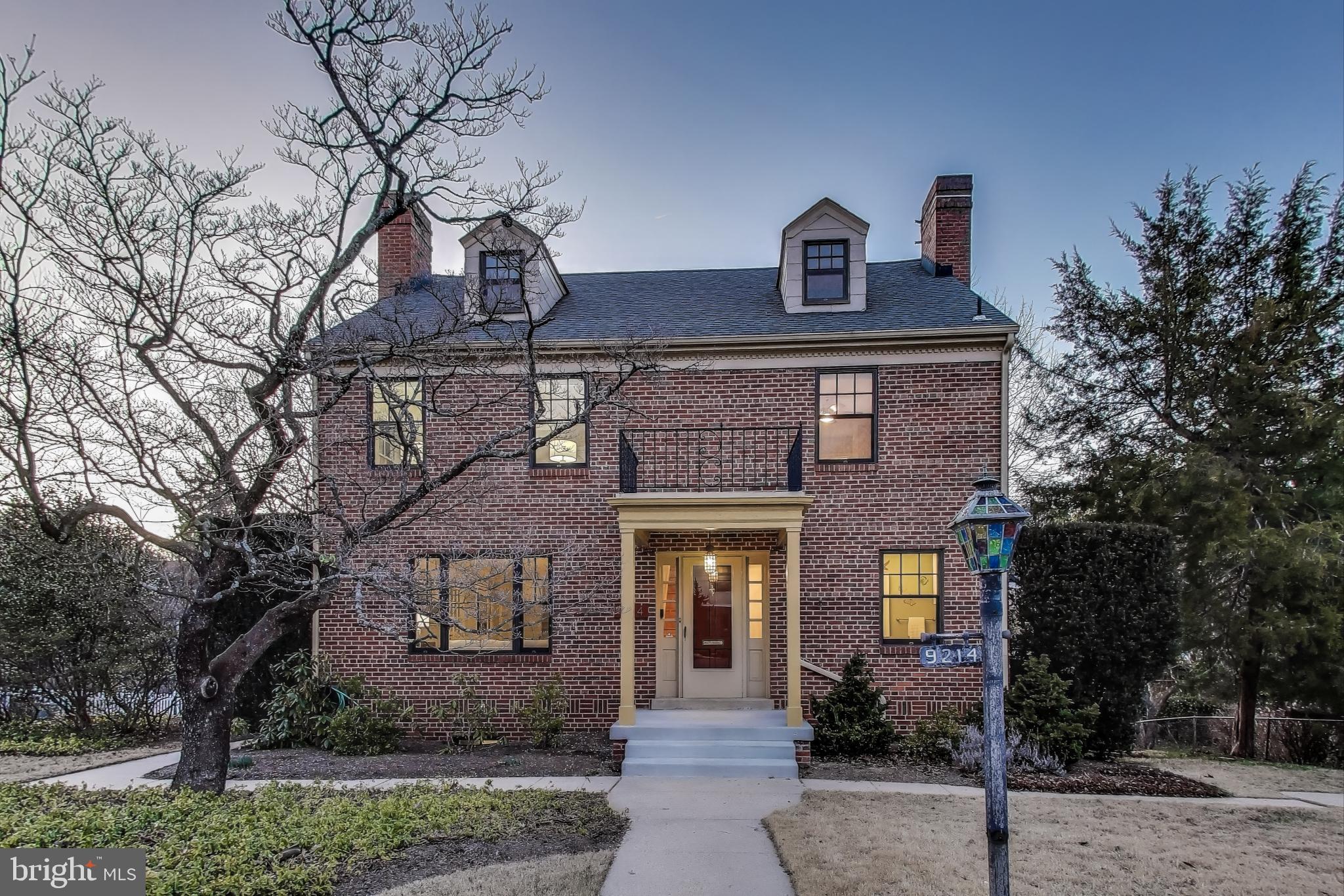 9214 Kingsbury Drive Silver Spring, MD 20910 - Photo 4 of 67 a front view of a house with yard