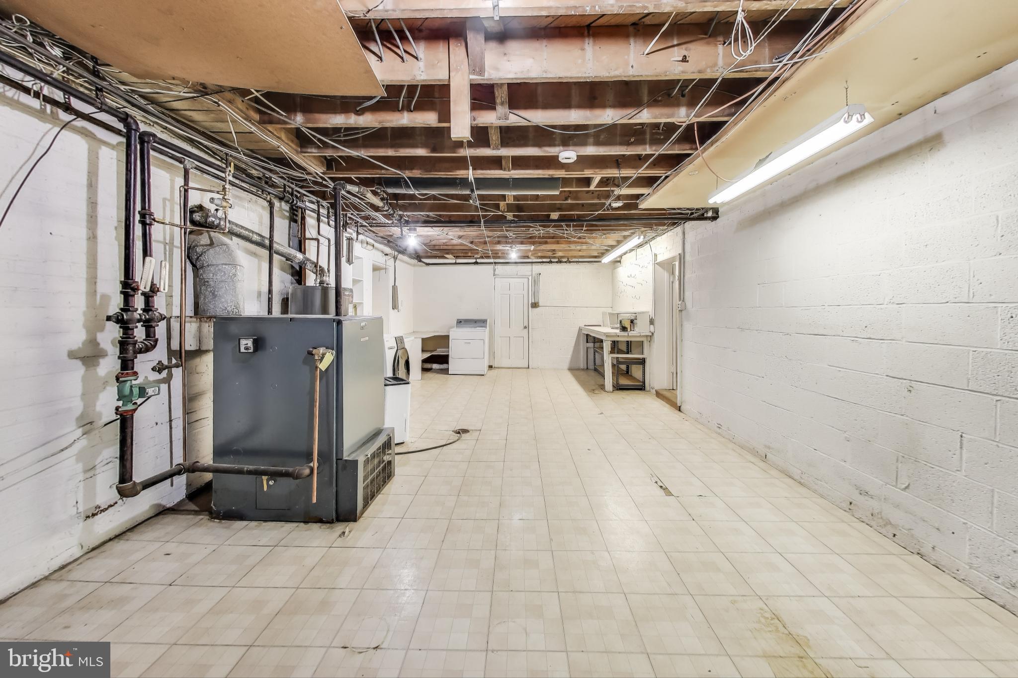 9214 Kingsbury Drive Silver Spring, MD 20910 - Photo 44 of 67 a view of empty room with wooden floor