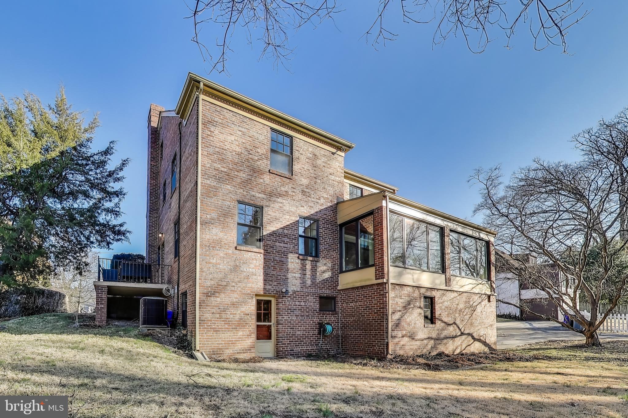 9214 Kingsbury Drive Silver Spring, MD 20910 - Photo 55 of 67 a front view of a house with yard