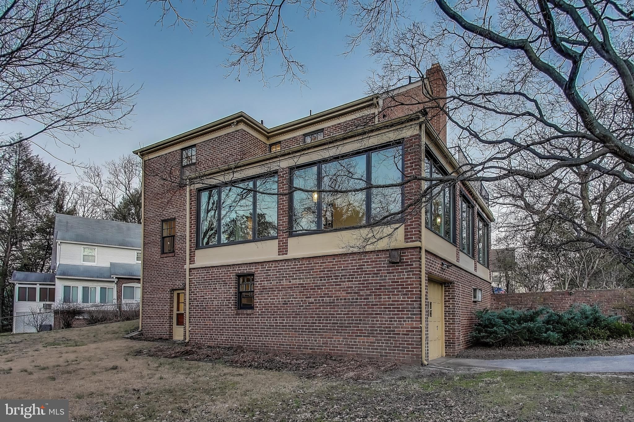 9214 Kingsbury Drive Silver Spring, MD 20910 - Photo 57 of 67 front view of a house with a yard
