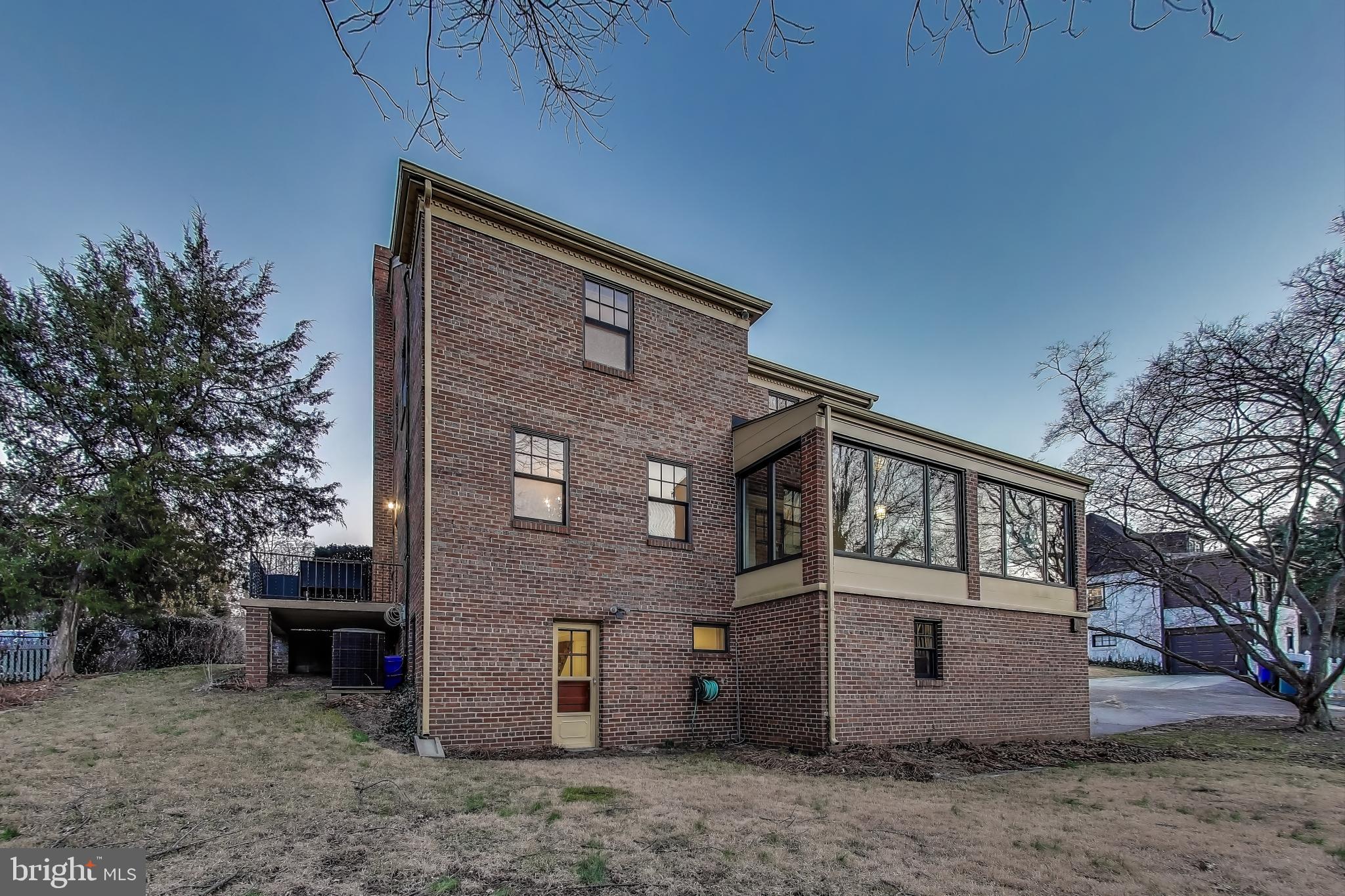 9214 Kingsbury Drive Silver Spring, MD 20910 - Photo 58 of 67 a front view of a house with a yard