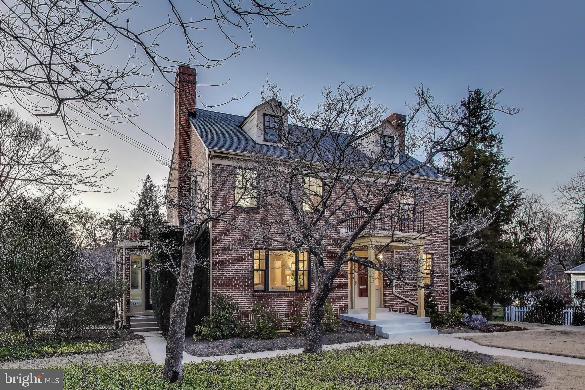 9214 Kingsbury Drive Silver Spring, MD 20910 - Photo 6 of 67 a front view of a house with garden