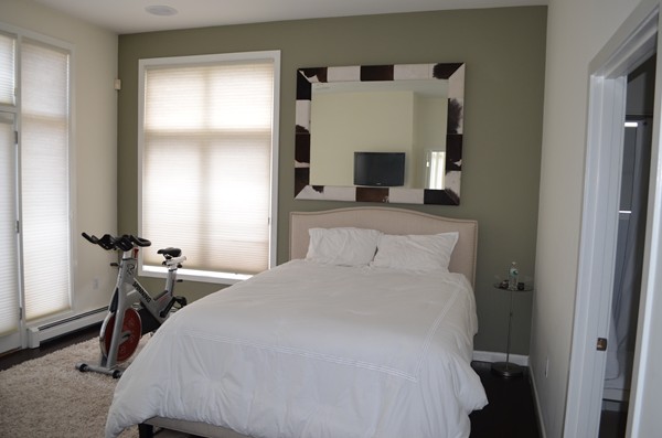 11 Elizabeth Road Marblehead, MA 01945 - Photo 12 of 29 a bedroom with a bed and a table
