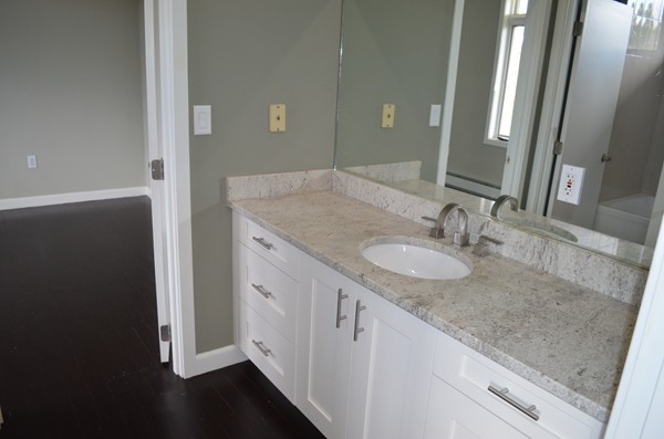 11 Elizabeth Road Marblehead, MA 01945 - Photo 19 of 29 a bathroom with a granite countertop sink and a mirror