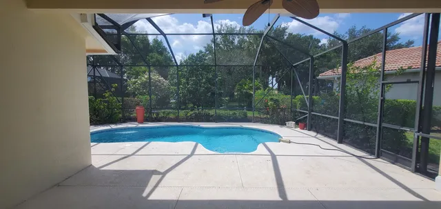 a bed room with a bed and a window