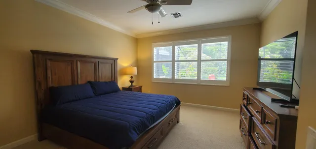 a bathroom with a toilet a sink and a mirror