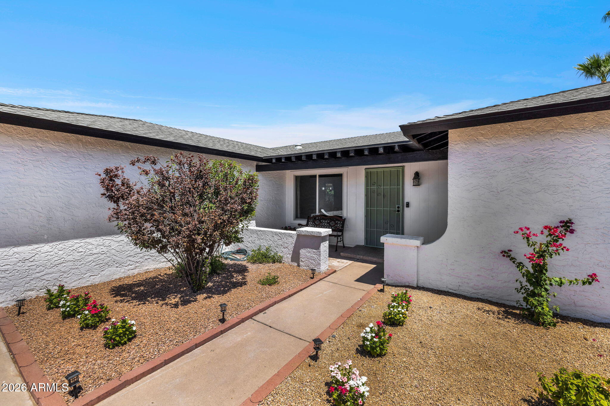 4910 East Presidio Road Scottsdale, AZ 85254 - Photo 3 of 57 Blooms Greet Along the Front Entry