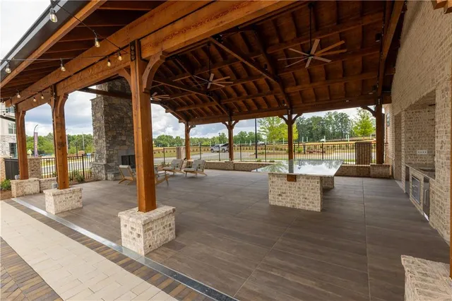 a view of a swimming pool with a porch